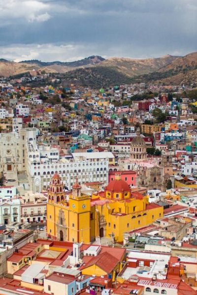 The beautiful Mexican Guanajuato city with colorful buildings surrounded by mountains