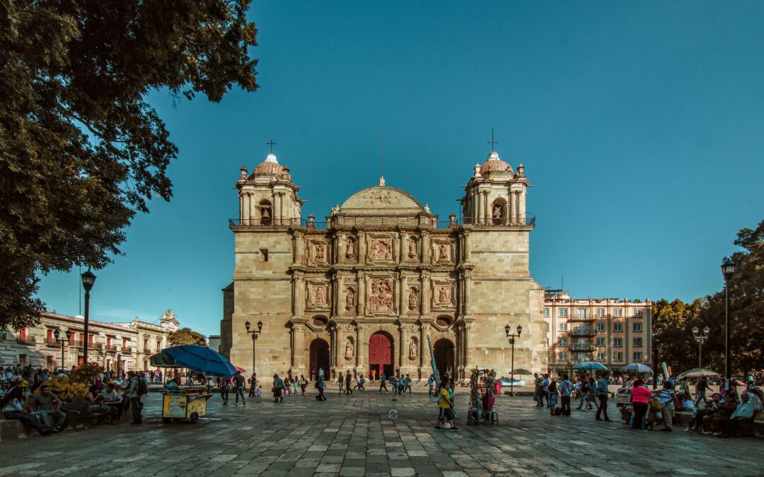 People outside of Oaxaca Cathedral in Mexico.